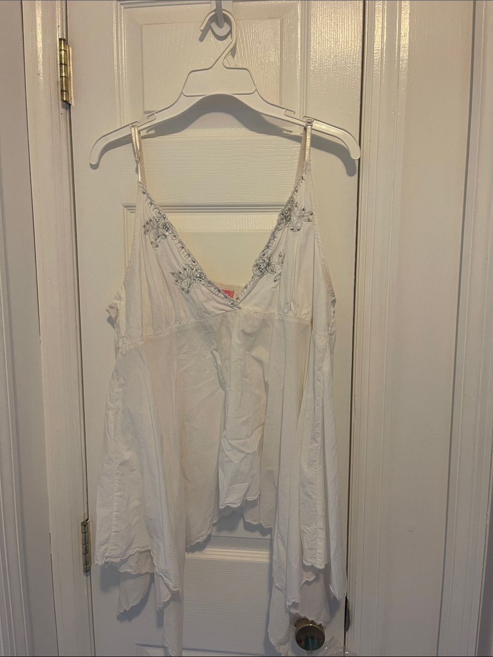 She's Cool White Beaded V-Neck Camisole with handkerchief hem at bottom